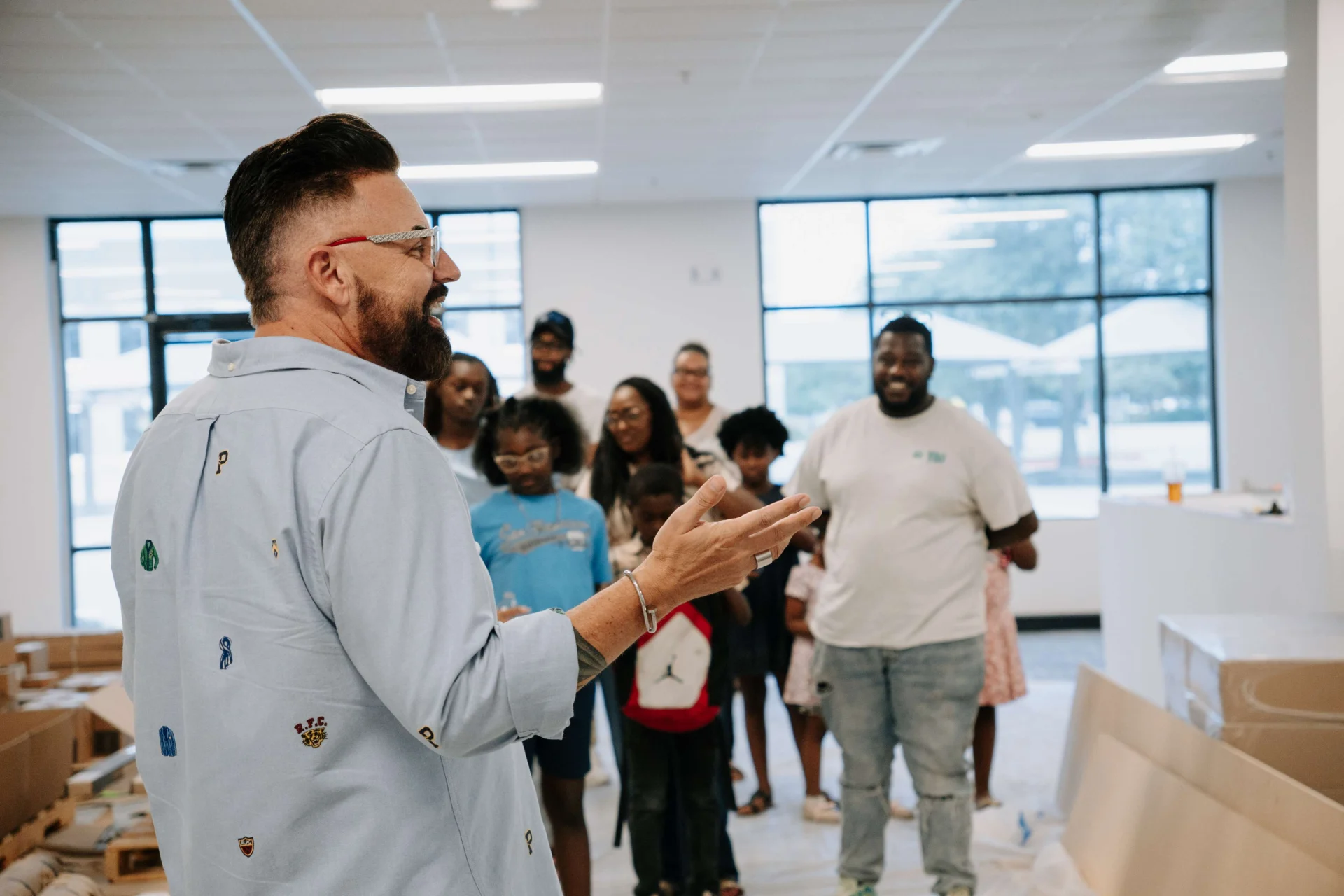 Pastor Ben leading a partner tour group through the building